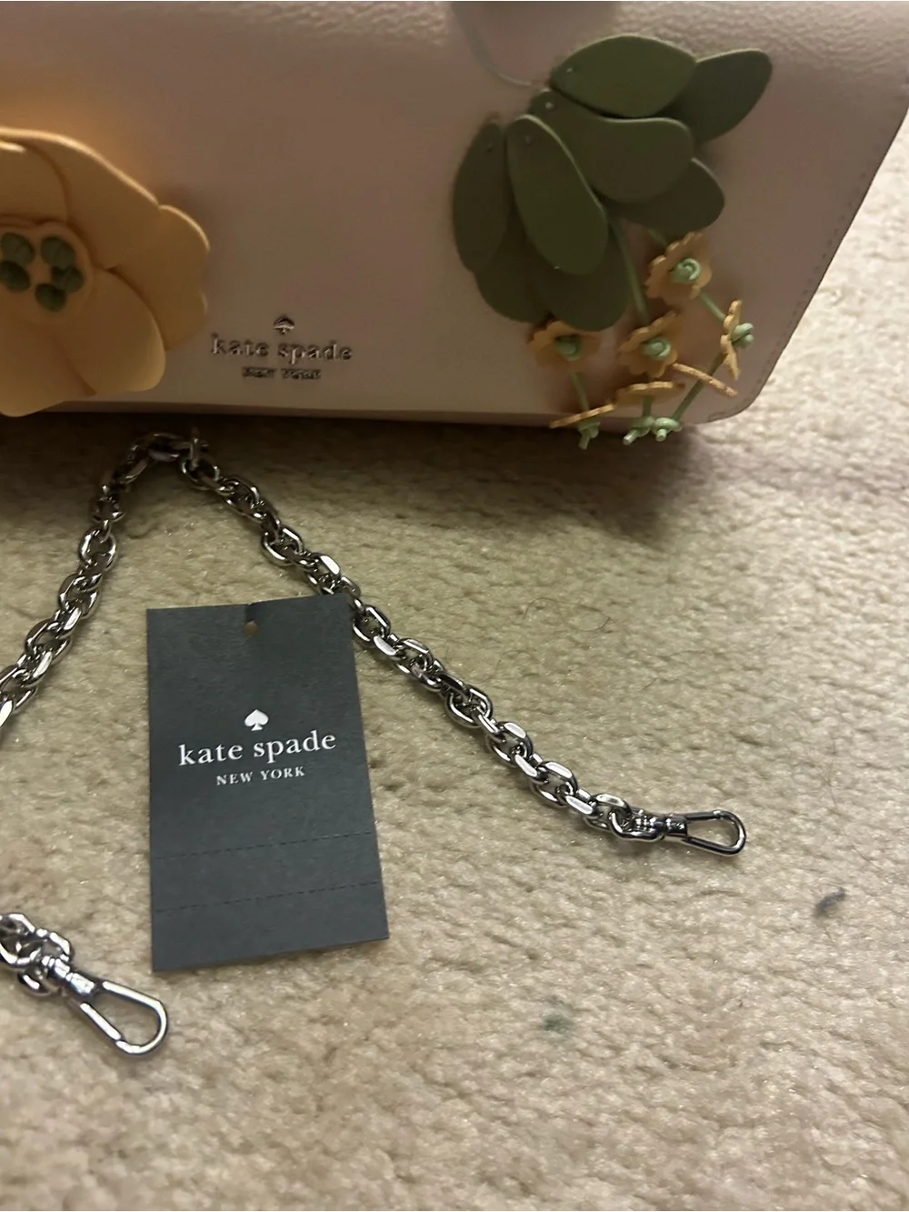 NWOT KATE SPADE floral appliqué leather crossbody bag.